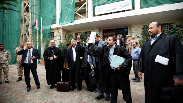Libyan lawyers celebrate after the court invalidated the country's parliament, outside the Supreme Court in Tripoli, November 6, 2014 - Sputnik International
