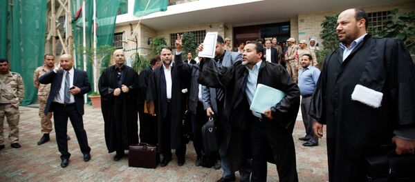 Libyan lawyers celebrate after the court invalidated the country's parliament, outside the Supreme Court in Tripoli, November 6, 2014 - Sputnik International