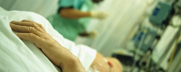 Intensive care. Hand of a patient who is being attended by a nurse in an intensive care unit (ICU) Intensive care. Hand of a patient who is being attended by a nurse in an intensive care unit (ICU) - Sputnik International