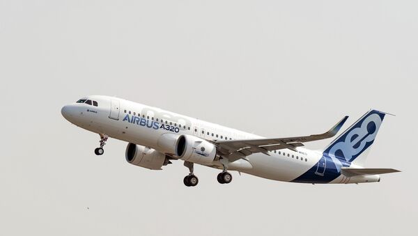 The new Airbus A320neo takes off for its first test flight at Toulouse-Blagnac airport, southwestern France, Thursday, Sept. 25, 2014 - Sputnik International
