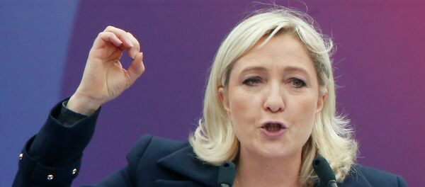 France's far-right National Front candidate leader Marine Le Pen delivers a speech at Opera during the traditional May Day march in Paris, Thursday May 1, 2014 France's far-right National Front candidate leader Marine Le Pen delivers a speech at Opera during the traditional May Day march in Paris, Thursday May 1, 2014 - Sputnik International