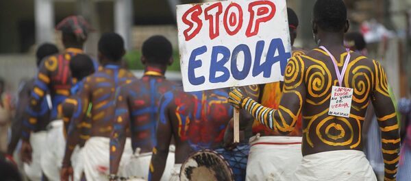 Actors parade on a street after performing at Anono school, during an awareness campaign against Ebola in Abidjan September 25, 2014 Actors parade on a street after performing at Anono school, during an awareness campaign against Ebola in Abidjan September 25, 2014 - Sputnik International