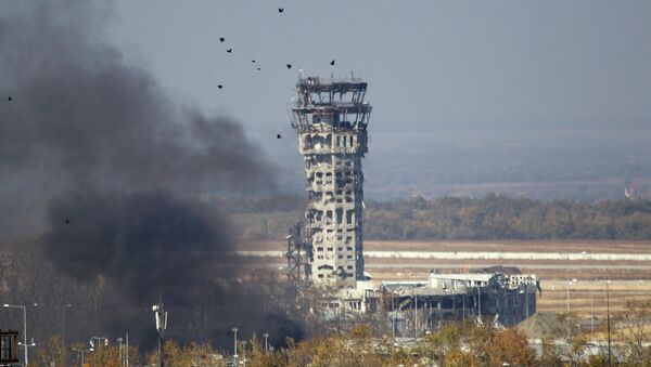 The traffic control tower of the Donetsk International Airport damaged by shelling during fighting between the independence supporters and pro-Kiev armed forces. - Sputnik International