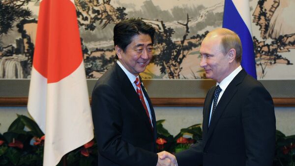 Russian President Putin and Japanese Prime Minister Abe also discussed a peace agreement and the crisis in Ukraine. - Sputnik International