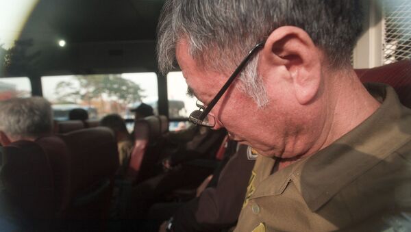 Lee Joon-seok, the captain of the sunken South Korean ferry Sewol, on the bus, arrives for verdict and sentence session at Gwangju District Court in Gwangju, South Korea, Tuesday, Nov. 11, 2014 - Sputnik International