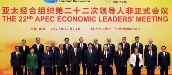Leaders pose for a group photo at the Asia-Pacific Economic Cooperation (APEC) summit at the International Convention Center in Yanqi Lake, Beijing, on Tuesday, Nov. 11, 2014 Leaders pose for a group photo at the Asia-Pacific Economic Cooperation (APEC) summit at the International Convention Center in Yanqi Lake, Beijing, on Tuesday, Nov. 11, 2014 - Sputnik International