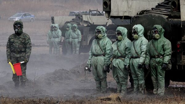 Servicemen of a radioactive and chemical protection unit during an inter-agency training exercise - Sputnik International