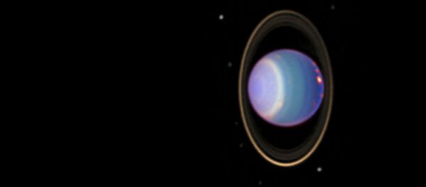 A recent Hubble Space Telescope (HST) view reveals Uranus surrounded by its 4 major rings and 10 of its 17 known satellites - Sputnik International