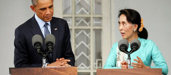 President Barack Obama and Myanmar opposition leader Aung San Suu Kyi met Friday at her home in Yangon to discuss the country's efforts toward democratization. President Barack Obama and Myanmar opposition leader Aung San Suu Kyi met Friday at her home in Yangon to discuss the country's efforts toward democratization. - Sputnik International