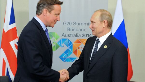 Russian President Vladimir Putin and UK Prime Minister David Cameron expressed their interest during the G20 summit in Brisbane, Australia, in restoring the relations between Russia and the West as well as in finding measures for settling the Ukrainian crisis. - Sputnik International