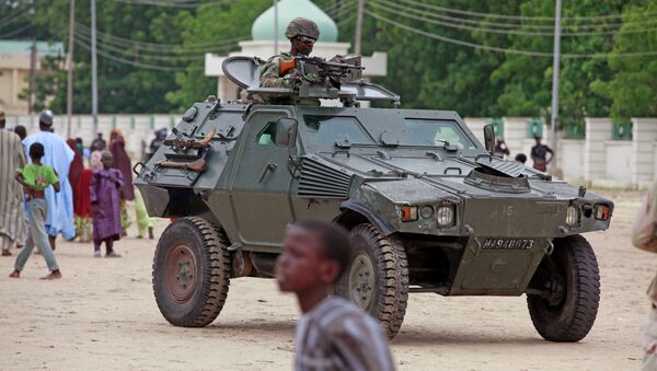A Nigerian soldier patrols in an armored car, during Eid al-Fitr celebrations, in Maiduguri, Nigeria. - Sputnik International