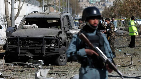 Afghan security forces inspect the site of a suicide attack in Kabul - Sputnik International