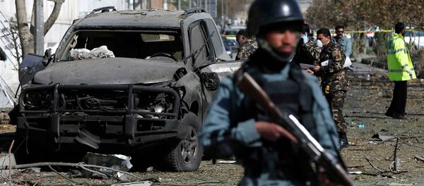Afghan security forces inspect the site of a suicide attack in Kabul Afghan security forces inspect the site of a suicide attack in Kabul - Sputnik International