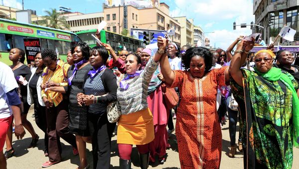 Protesters marched on the streets of Nairobi in support of a woman, who was attacked and stripped by a group of men last week. - Sputnik International