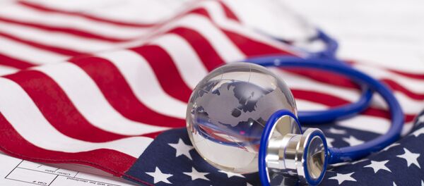 The cost of healthcare and low wages are some of the most pressing financial problems American families facing, according to a Gallup poll. The cost of healthcare and low wages are some of the most pressing financial problems American families facing, according to a Gallup poll. - Sputnik International