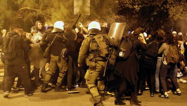 Riot policemen clash with protesters at a rally marking the 41st anniversary of a 1973 student uprising against a US backed military dictatorship in Greece. - Sputnik International