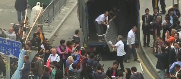 Dismantling of Barricades Built by Occupy Central Protesters Begins in Hong Kong Dismantling of Barricades Built by Occupy Central Protesters Begins in Hong Kong - Sputnik International
