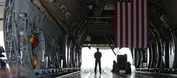 A serviceman stands inside the US military transport aircraft C-5 Galaxy. File photo A serviceman stands inside the US military transport aircraft C-5 Galaxy. File photo - Sputnik International