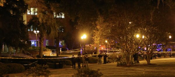 Police investigate a shooting scene at Strozier Library on Florida State campus on Thursday, Nov. 20, 2014, in Tallahassee, Fla Police investigate a shooting scene at Strozier Library on Florida State campus on Thursday, Nov. 20, 2014, in Tallahassee, Fla - Sputnik International