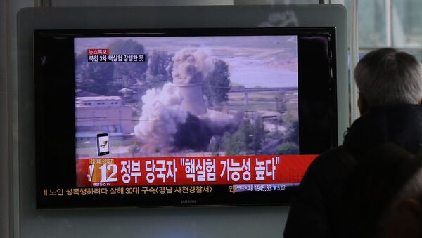 A South Korean man watches a TV news showing a file footage of North Korea's nuclear test at the Seoul train station in Seoul, South Korea - Sputnik International
