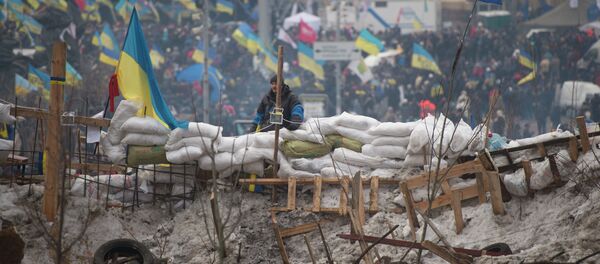 European integration activists built up barricades and put wardens at the Independence Square in Kiev, Ukraine - Sputnik International