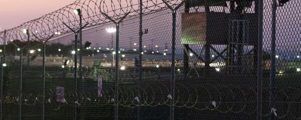 Guard tower at dawn at Camp Delta the military prison - Sputnik International