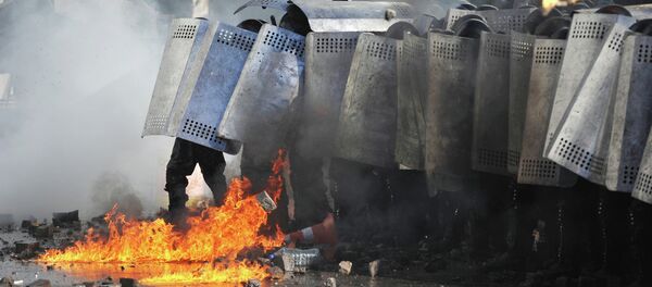 Police officers during the clashes. - Sputnik International