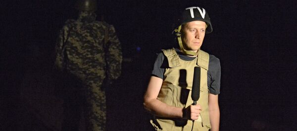 VGRTK correspondent Kornelyuk was heavily wounded during mortar shelling in Lugansk and died of injuries in a local hospital. VGRTK correspondent Kornelyuk was heavily wounded during mortar shelling in Lugansk and died of injuries in a local hospital. - Sputnik International