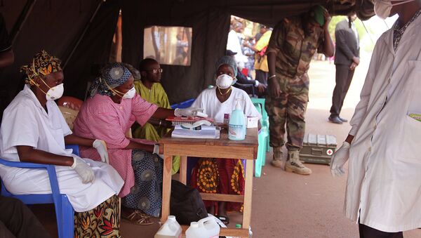 Health care workers at a screening center for the Ebola virus await patients at the border village of Kouremale, Mali - Sputnik International