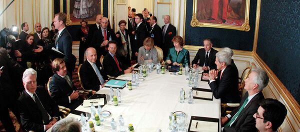 French Foreign Minister Laurent Fabius (3rd L), EU envoy Catherine Ashton (6th L), U.S. Secretary of State John Kerry (3rd R) and Britain's Foreign Secretary Philip Hammond (front L) sit a a table during talks in Vienna November 21, 2014 French Foreign Minister Laurent Fabius (3rd L), EU envoy Catherine Ashton (6th L), U.S. Secretary of State John Kerry (3rd R) and Britain's Foreign Secretary Philip Hammond (front L) sit a a table during talks in Vienna November 21, 2014 - Sputnik International