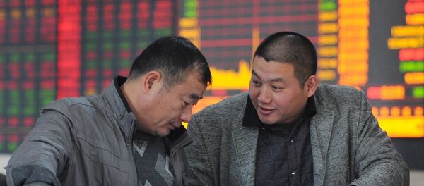 The Shanghai Stock Exchange Composite Index climbed 1% to 2,630.49 at its close on Wednesday, - Sputnik International