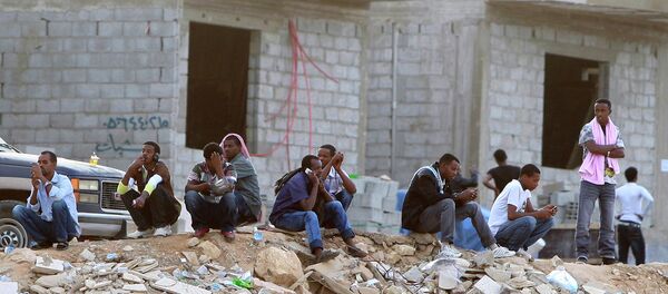 Spanish National Police has uncovered an international criminal network comprising 18 people, who illegally transferred Syrian and Iraqi citizens to Spain and other European countries. Spanish National Police has uncovered an international criminal network comprising 18 people, who illegally transferred Syrian and Iraqi citizens to Spain and other European countries. - Sputnik International