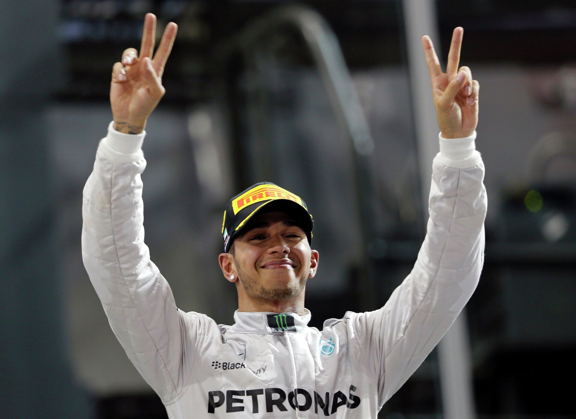 Mercedes Formula One driver Lewis Hamilton of Britain celebrates on the podium after winning the Abu Dhabi F1 Grand Prix at the Yas Marina circuit in Abu Dhabi  - Sputnik International, 1920, 21.04.2022
