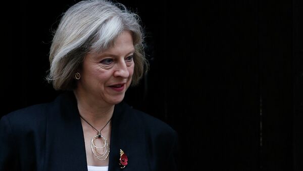 UK law enforcement and intelligence agencies do not have the full capability to tackle online sexual abuse against children, Home Secretary Theresa May said Wednesday. - Sputnik International