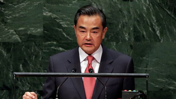 Foreign Minister Wang Yi, of China, addresses the 69th session of the United Nations General Assembly, at U.N. headquarters - Sputnik International