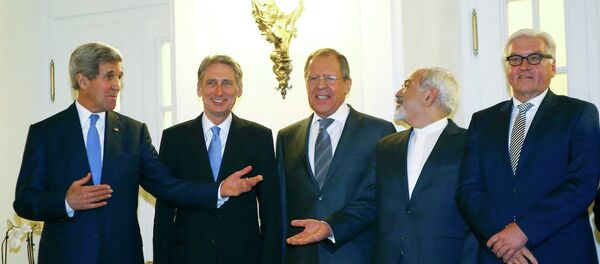U.S. Secretary of State John Kerry, Britain's Foreign Secretary Philip Hammond, Russian Foreign Minister Sergei Lavrov, Iranian Foreign Minister Javad Zarif and German Foreign Minister Frank-Walter Steinmeier (L to R) pose for photographers before a meeting in Vienna U.S. Secretary of State John Kerry, Britain's Foreign Secretary Philip Hammond, Russian Foreign Minister Sergei Lavrov, Iranian Foreign Minister Javad Zarif and German Foreign Minister Frank-Walter Steinmeier (L to R) pose for photographers before a meeting in Vienna - Sputnik International