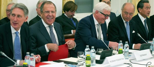 Britain's Foreign Secretary Philip Hammond, Russian Foreign Minister Sergei Lavrov, German Foreign Minister Frank-Walter Steinmeier, French Foreign Minister Laurent Fabius and Chinese Foreign Minister Wang Yi, from left Britain's Foreign Secretary Philip Hammond, Russian Foreign Minister Sergei Lavrov, German Foreign Minister Frank-Walter Steinmeier, French Foreign Minister Laurent Fabius and Chinese Foreign Minister Wang Yi, from left - Sputnik International