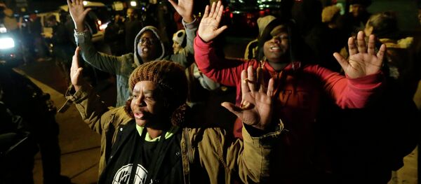 Thousands of Americans took to the streets after the grand jury ruled not to indict the policeman who had shot unarmed Michael Brown. - Sputnik International