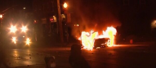 Protesters Riot in Ferguson Setting Buildings, Cars Alight - Sputnik International