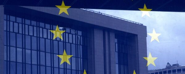 European Council building is reflected in a photograph of the EU flag on the wall of the European Council building, in Brussels - Sputnik International