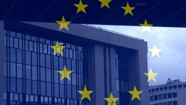 European Council building is reflected in a photograph of the EU flag on the wall of the European Council building, in Brussels - Sputnik International