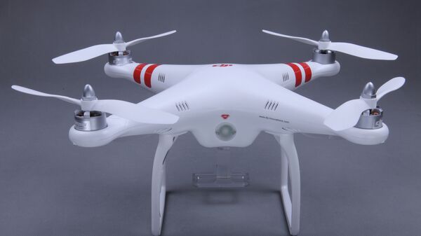 In this January 13, 2013 photo provided by DJI North America is the Phantom drone. The $700 Phantom, made by Chinese company DJI, is at the forefront of bringing drone technology to the masses. - Sputnik International