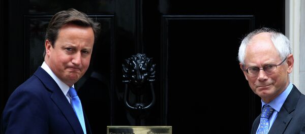 Britain's Prime Minister David Cameron, left, poses for members of the media with Herman van Rompuy, right - Sputnik International