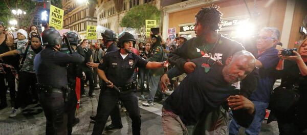 Making policemen wear body-mounted cameras and recording interactions with the public will not change the behavior of a force that is ultimately racist - Sputnik International