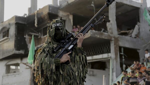 A Palestinian militant of Izzedine al-Qassam Brigades, military wing of Hamas - Sputnik International