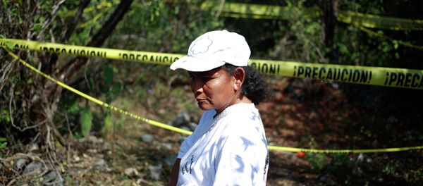 A woman with missing relatives in Mexico. A woman with missing relatives in Mexico. - Sputnik International