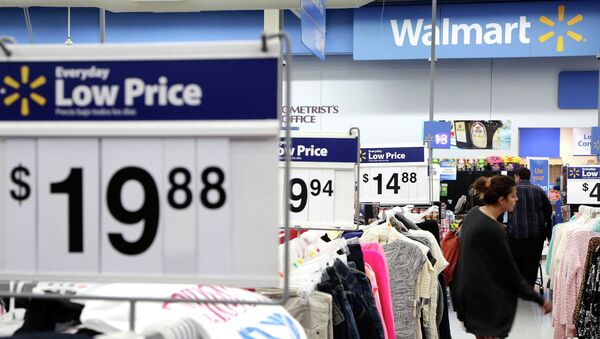 A woman shops at Walmart as the store prepares for Black Friday in Los Angeles, California November 24, 2014 - Sputnik International