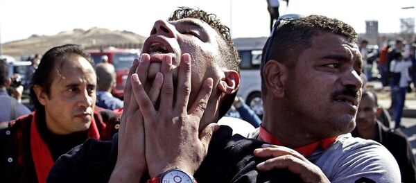An anti-Hosni Mubarak protester reacts after hearing the verdict of the trial of the former Egyptian President - Sputnik International