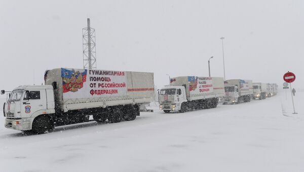 Another humanitarian aid convoy to eastern Ukraine, the ninth for this year, has reached the Russia-Ukraine border. - Sputnik International