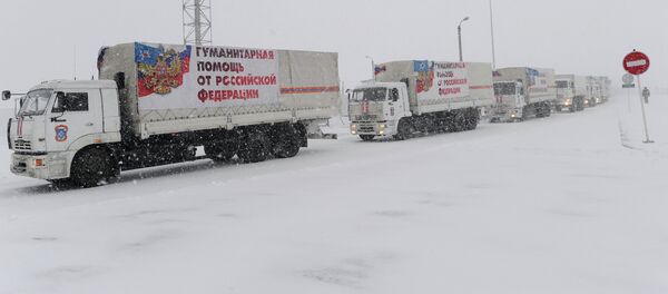 The tenth Russian humanitarian convoy for Eastern Ukraine will take the road on Thursday. - Sputnik International